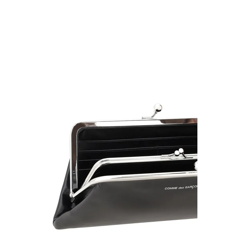 Comme Des Gar?ons Wallet with a kiss-lock closure